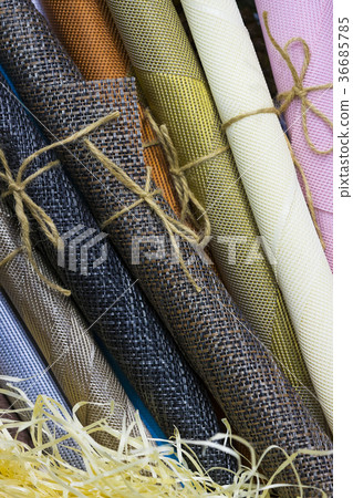 Rolls of wrapping paper binding with rope Rolls of wrapping paper binding with rope 36685785
