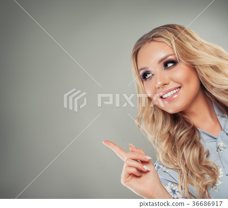 Young Cute Woman Student Pointing her Finger Young Cute Woman Student Pointing her Finger 36686917
