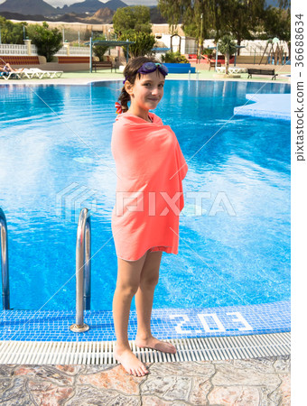 Cute teen girl in swimming pool Cute teen girl in swimming pool 36688634