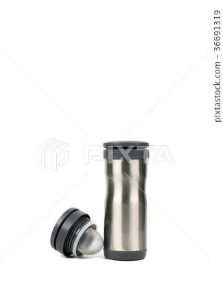 Silver thermos bottle with opened cap on white  36691319