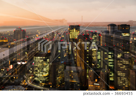 City blurred bokeh light double exposure  City blurred bokeh light double exposure  36693455