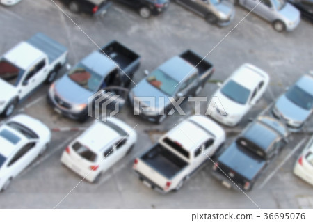blurred outdoor parking lot full of cars blurred outdoor parking lot full of cars 36695076