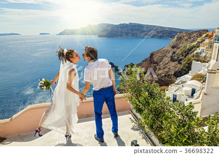 Beautiful young couple on sea background Beautiful young couple on sea background 36698322