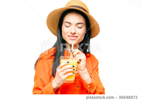 Woman drinks fresh juice fruit, white background 36698872
