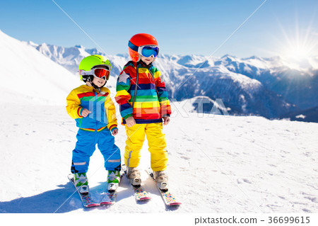 Ski and snow winter fun for kids. Children skiing. Ski and snow winter fun for kids. Children skiing. 36699615