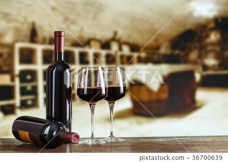 Wine cellar with wine bottle and glasses Wine cellar with wine bottle and glasses 36700639