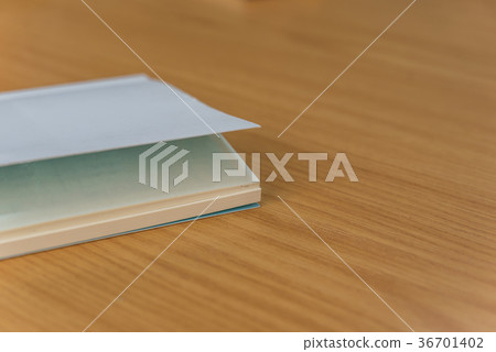 Notebook or note paper sheet retro style on table 36701402