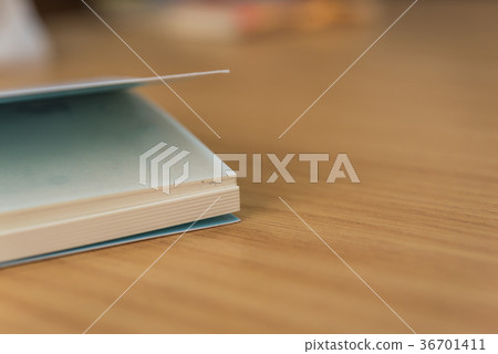 Notebook or note paper sheet retro style on table Notebook or note paper sheet retro style on table 36701411