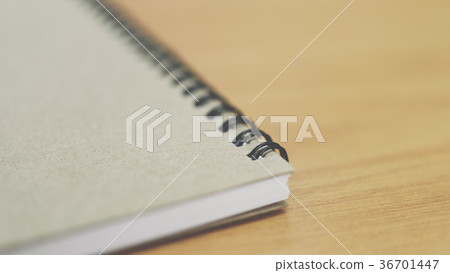 Notebook or note paper sheet retro style on table 36701447