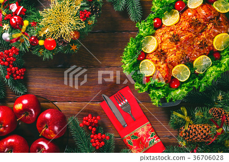 Christmas table dinner time with roasted meats  36706028
