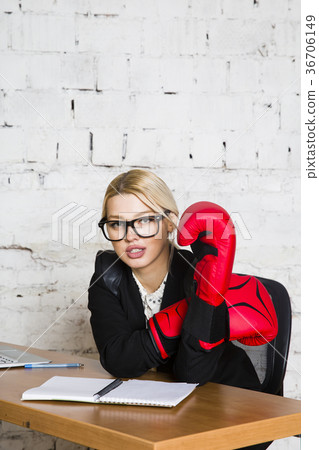 Young blond beauty businesswoman sitting at a 36706149