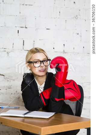 Young blond beauty businesswoman sitting at a 36706150