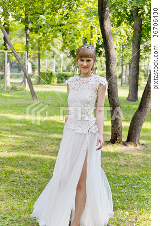 Beautiful bride in white lace dress of summer time 36706430