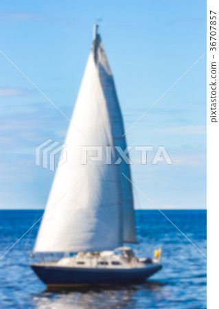 Blue sailboat - blurred image Blue sailboat - blurred image 36707857