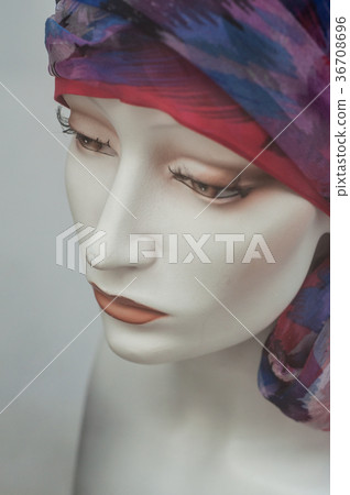 woman face of mannequin with wig in fashion store 36708696