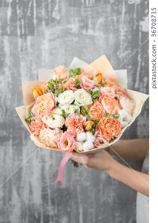 beautiful luxury bouquet of mixed flowers in woman 36708715
