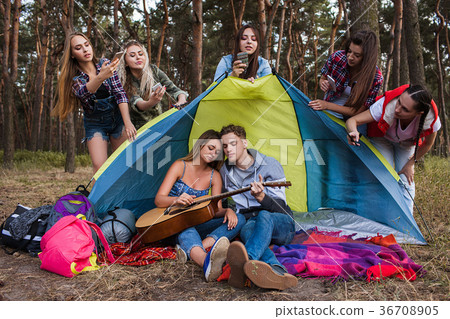 Love couple playing guitar paparazzi concept. Love couple playing guitar paparazzi concept. 36708905