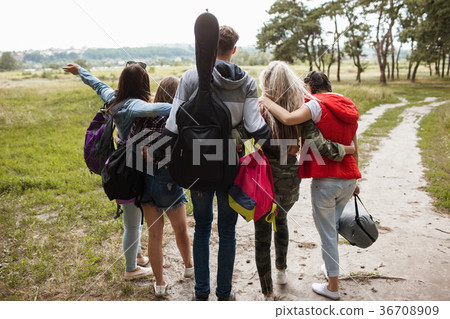 Friendly hugs admire nature tourism concept 36708909