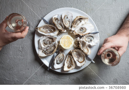 Exotic dish - oysters with wine 36708980
