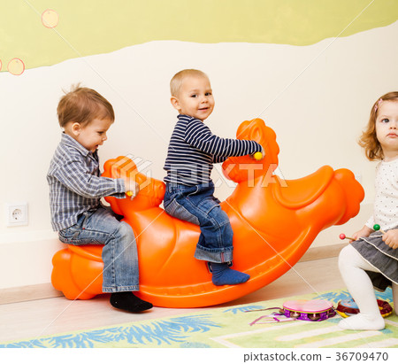 Children on the rocking seesaw Children on the rocking seesaw 36709470