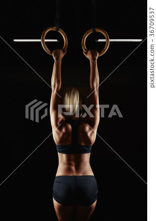 Female fitness athlete exercising 36709537