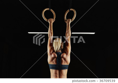 Female fitness athlete exercising Female fitness athlete exercising 36709539
