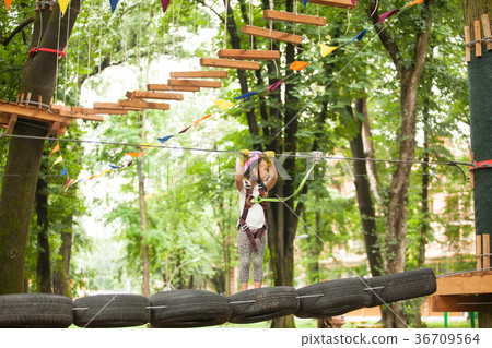 The obstacle course in adventure park  36709564