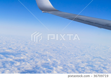 Landscape above the clouds In-flight photography (over Japan) Wing of an airplane Landscape above the clouds In-flight photography (over Japan) Wing of an airplane 36709719