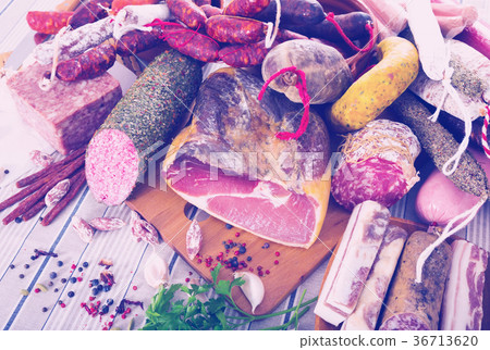 Variety of meats on table 36713620