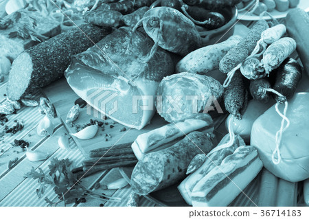 Variety of meats and sausages on table Variety of meats and sausages on table 36714183