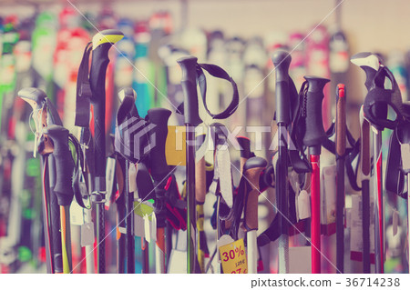 ski-sticks on showcase of store 36714238