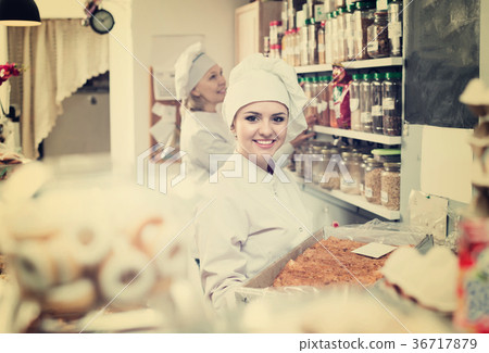 Two female sellers in confectionery Two female sellers in confectionery 36717879