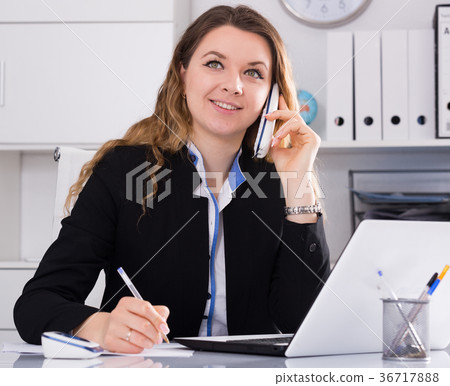 Bussineswoman filling up documents Bussineswoman filling up documents 36717888