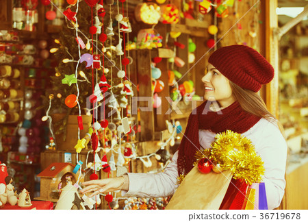 Girl shopping at festive fair 36719678