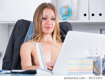 Topless businesswoman on laptop Topless businesswoman on laptop 36721933