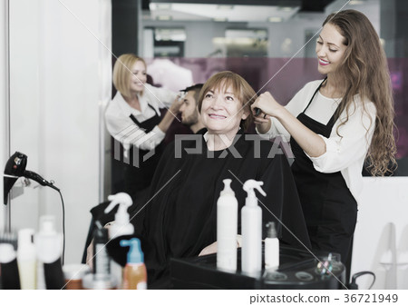 Elderly woman smiling at the hair salon 36721949