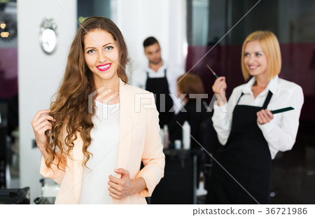 Smiling girl in the hair salon 36721986