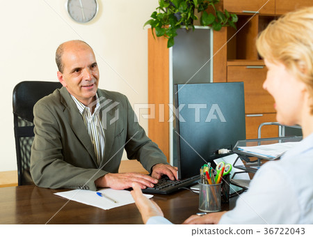 Client talking with notary Client talking with notary 36722043