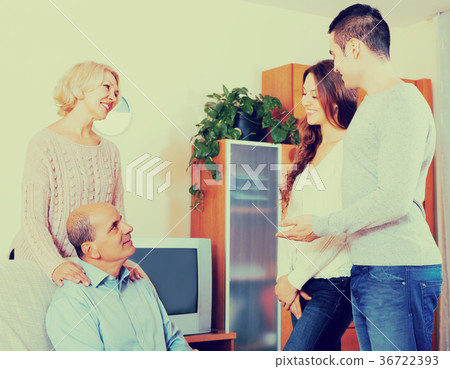 Man showing his future wife Man showing his future wife 36722393