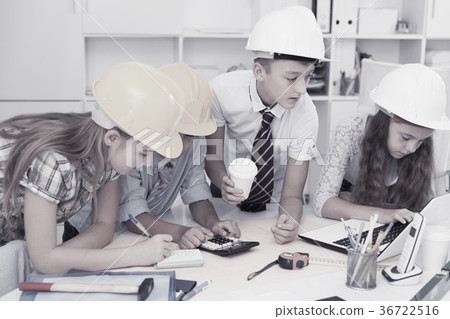 Children in helmet talking about building 36722516