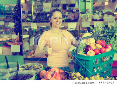 Woman with basket with fruits and vegetables 36724292