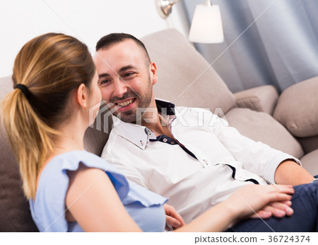 Young female is flirting with her husband in time resting Young female is flirting with her husband in time resting 36724374
