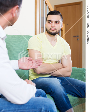 Male young arguing about something 36724469