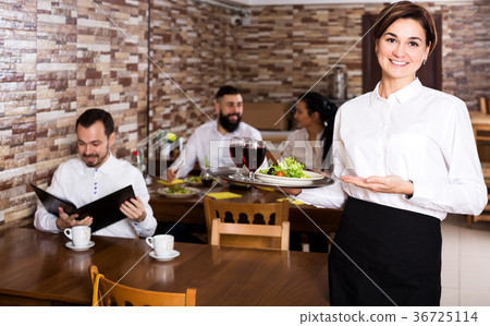 Female waiter showing country restaurant 36725114