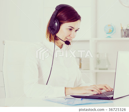 Woman in call-centre Woman in call-centre 36725326