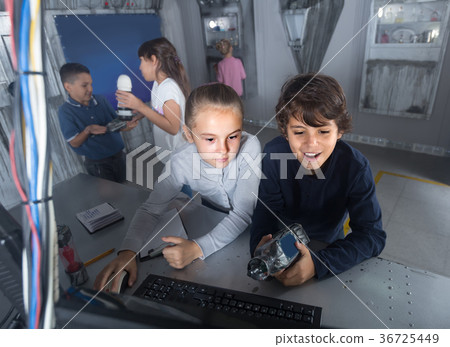 children play in the quest room of a inscrutable bunker 36725449