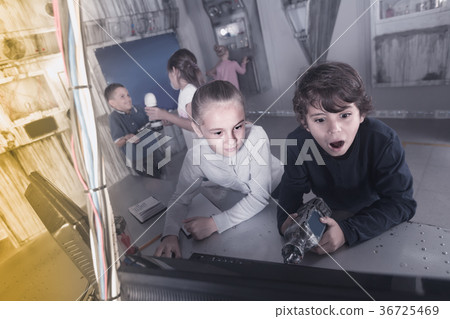 children play in the quest room of a inscrutable bunker 36725469