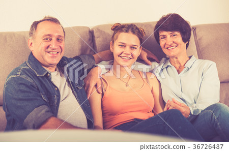 Portrait of happy family on sofa 36726487