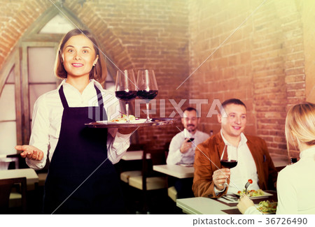 Female waiter in country restaurant 36726490