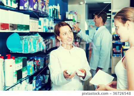 Woman pharmacist in drug store Woman pharmacist in drug store 36726548